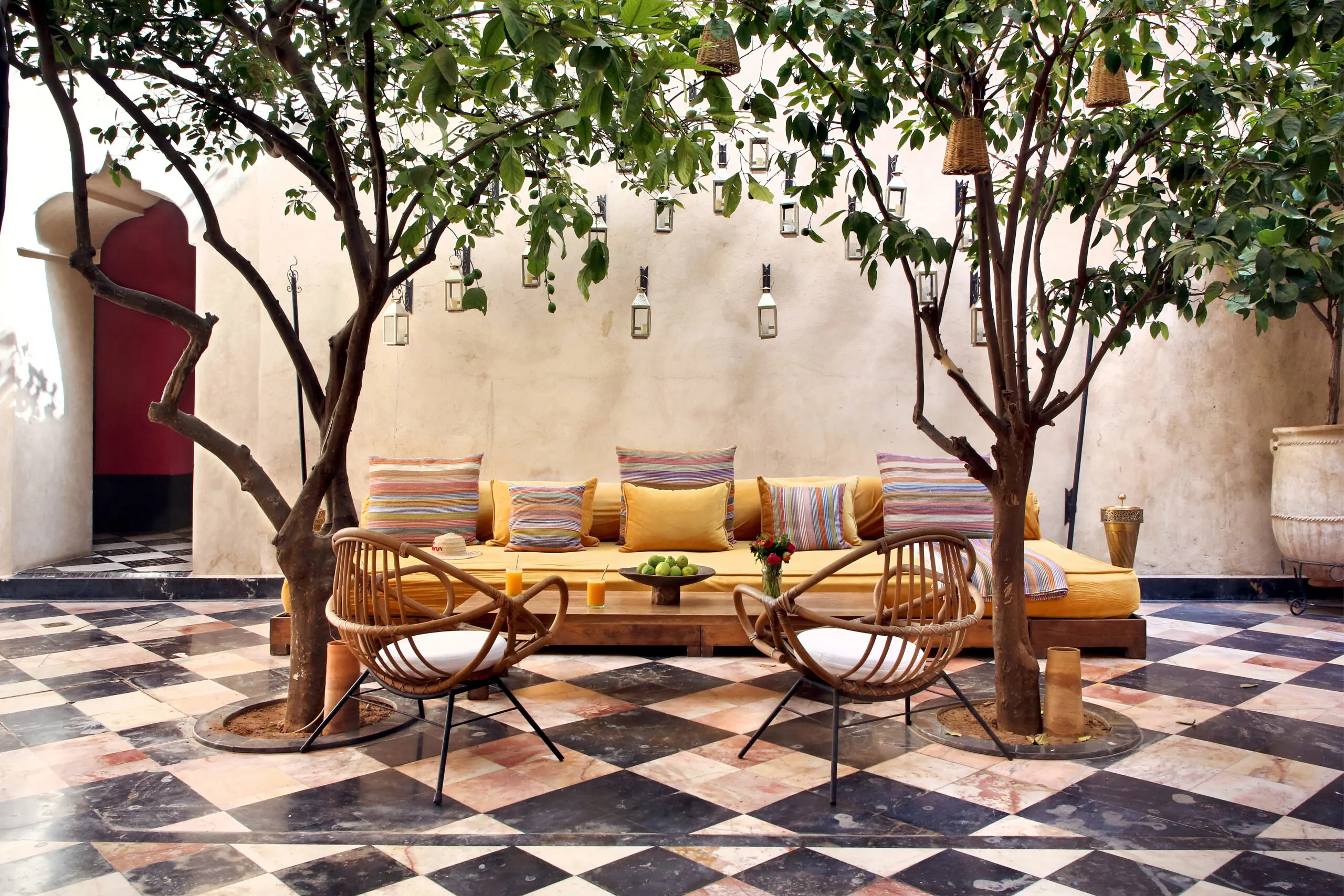 Colorful luxury suite at Riad El Fenn with traditional Moroccan furnishings and modern art