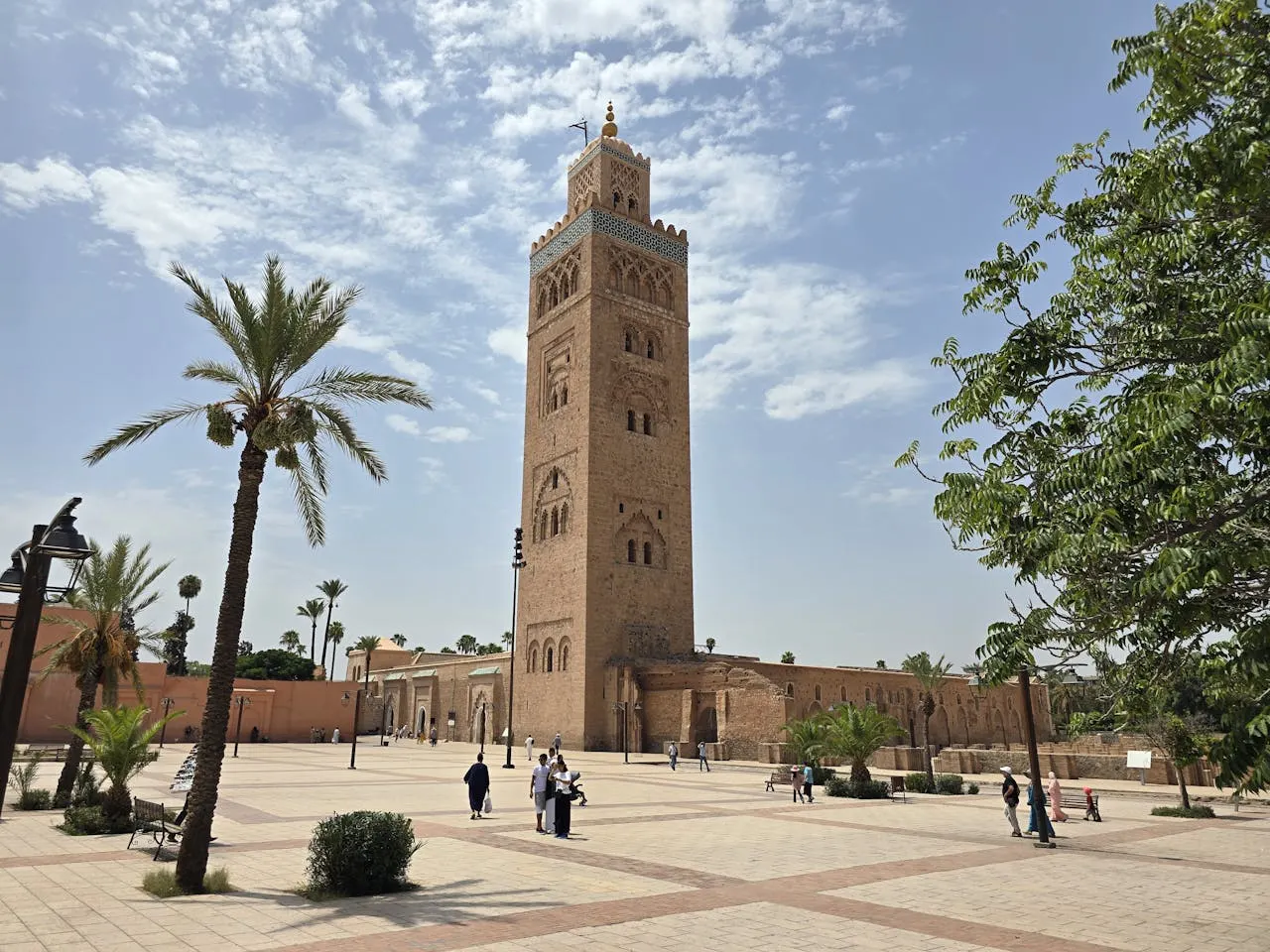 Panoramic view of Marrakech with Koutoubia Mosque and Atlas Mountains in background