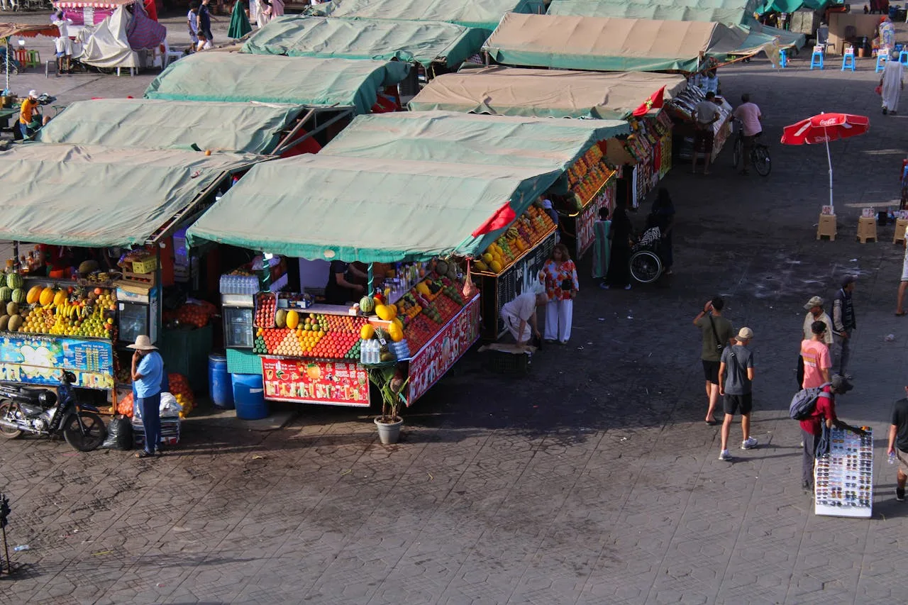 The vibrant Jemaa el-Fna square in Marrakech with its street performers and market stalls.