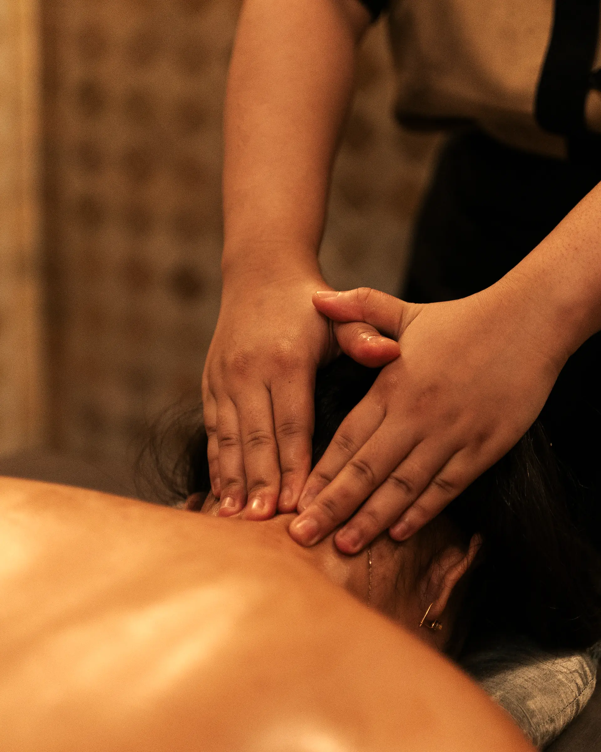 Traditional Moroccan hammam ritual setup in a luxury riad spa with copper bowls and natural products