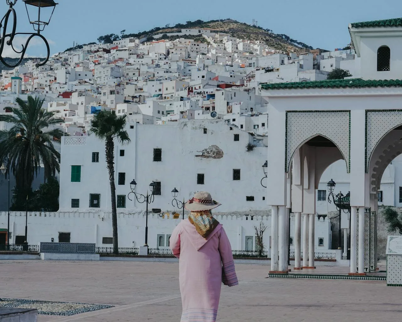 The white buildings and narrow streets of Tetouan's UNESCO-listed medina with mountain backdrop